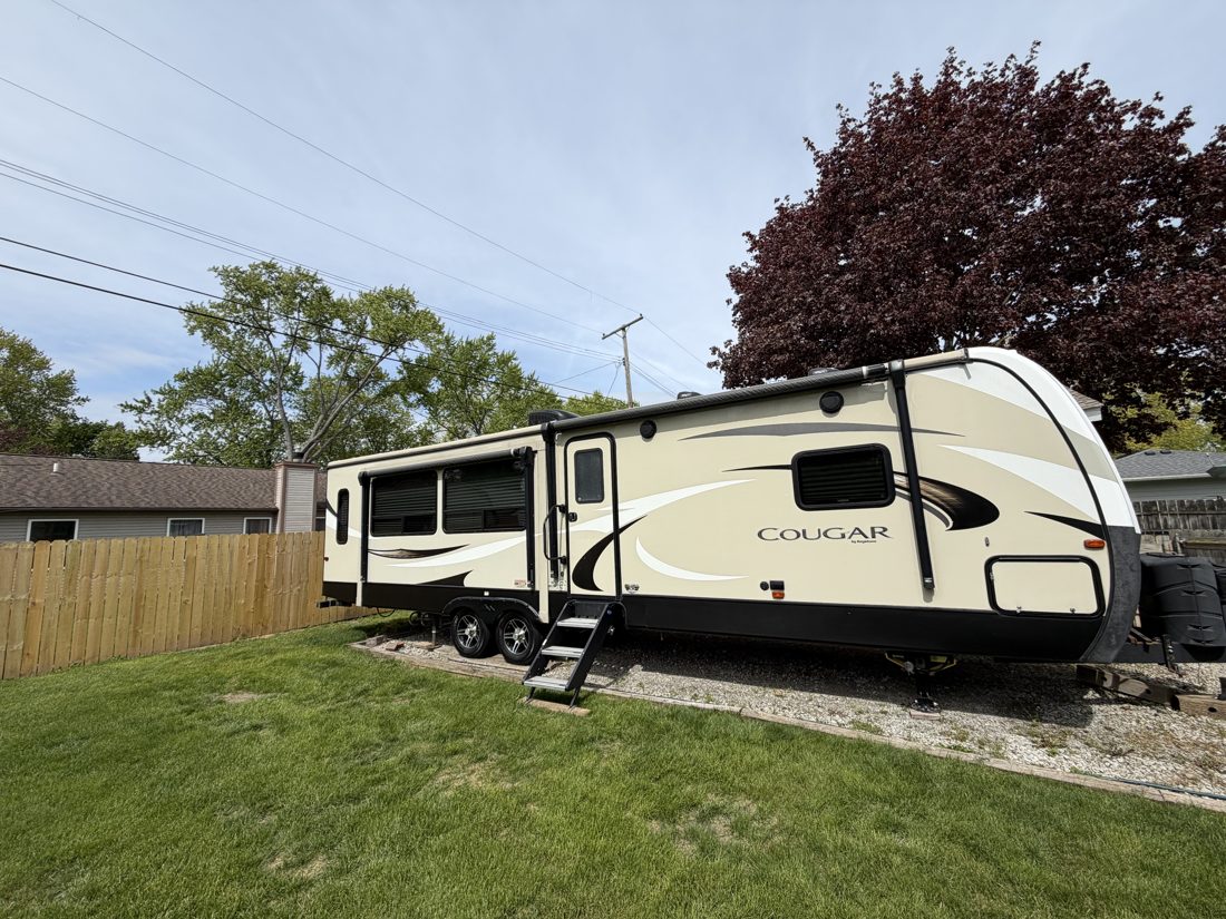 Freshly washed travel trailer exterior detailed by Dee's Auto Detailing